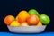 Colorful plate full of Citruses fruits. Oranges, grapefruits.