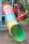 A colorful playhouse with some slides