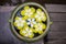 Colorful of Plumeria flower floating in the ancient bowl