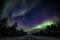 Colorful polar arctic Northern lights Aurora Borealis activity in winter Finland