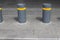 Colorful poles and curbs along the sidewalk in a big city in Israel