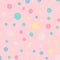 Colorful polka dots pattern on bright background.