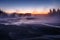 Colorful Porcelain Basin area trailwith steaming surface during beautiful sunset in Yellowstone National Park, Wyoming