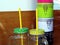 Colorful porcelain sugar jars stacked and glass cups with metal lids and straws