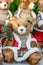 Colorful portrait of puppet doll toy teddy bears, dressed like Santa Claus