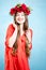 Colorful portrait of a woman with flower wreath