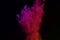 Colorful of powder explosion on black background.Colorful of dust explosive on dark background.Paint holi.