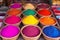 Colorful powder for sale in shop during Holi color festival, neural network generated photorealistic image