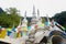 Colorful praying flags on ancient pagoda on mountainside