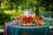 colorful punch bowl with floating fruit on garden table