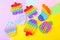 Colorful Push Pop It Bubble Sensory Fidget Toys of different shapes, on colorful background