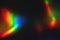 colorful rainbow crystal light leaks on black background