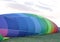 Colorful rainbow diagonal design on a hot air balloon.