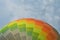 Colorful rainbow diagonal design on a hot air balloon.