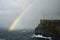 A colorful rainbow over the Cliffs of Moher in Ireland