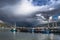 Colorful Rainbow Over Fisher Boats In The Picturesque Harbor Of Ullapool In Scotland