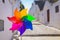 Colorful rainbow pinwheel in sun shine summer day.