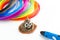 Colorful rainbow plastic filaments with for 3D pen laying on white. New toy for child. 3d paintings and figures with their own han
