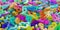 Colorful rainbow spectrum colored random digit plastic numbers heap background, algebra, education or science concept