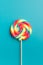 Colorful rainbow swirl lollipop.