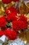 Colorful Red and golden flower and lighting wedding stage decoration. Plastic artificial flower.