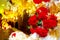 Colorful Red and golden flower and lighting wedding stage decoration. Plastic artificial flower.