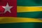 Colorful ribbon as Togo national flag, Five equal horizontal bands of green alternating with yellow; with a red canton bearing a