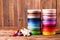 Colorful ribbon bobbins on the wooden table