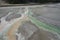 Colorful rivulets pouring from a thermal pool at yellowstone park.