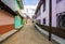 Colorful road with traditional houses in colonial style in San Cristobal de las Casas, Chiapas, Mexico