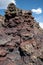 Colorful rock formation in volcanic rock at Craters of the Moon National Monument along Spatter Cones trail