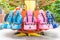 Colorful roller coaster seats at amusement park