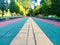 Colorful rough cobblestone bricks floor as pathway for jogging in the park