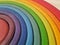 Colorful round stacked rainbow wooden pieces