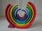 Colorful round stacked rainbow wooden pieces