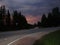 Colorful round storm cloud over the road