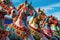 colorful row of carousel horses against blue sky