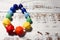 Colorful rubber necklace children`s toy on wooden background