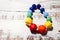 Colorful rubber necklace children`s toy on wooden background