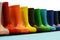 Colorful rubber rain boots for kids on the shelf of a store, waterproof footwear for fall
