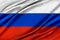 Colorful Russia flag waving in the wind.