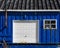 Colorful and rustic royal blue shed