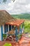 Colorful rustic wooden house at the Vinales Valley