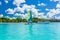 Colorful sail catamaran on the beach of Bayahibe at Caribbean Sea