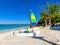 Colorful sailboats and motorboat, on a tropical beach at Half Moon Cay in the Bahamas