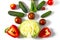 Colorful salad ingredients pattern made of cherry tomatoes, tomatoes, rosemary, cucumber, onion, chilli pepper, Garden