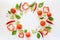 Colorful salad ingredients pattern made of tomatoes, pepper, chili, garlic, cucumber slices and basil
