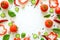 Colorful salad ingredients pattern made of tomatoes, pepper, chili, garlic, cucumber slices and basil on white background