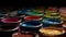 Colorful sample paint pots encircle an overhead DIY paint brush, providing copy space