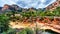 The colorful sandstone mountains and canyon carved by Oak Creek at famous Slide Rock State Park along Arizona SR89A